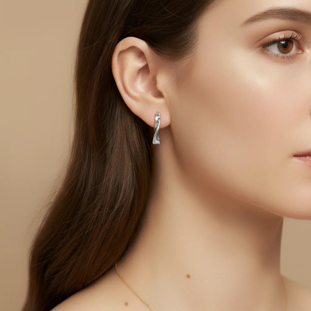 Kolczyki koła srebrne – skręcone koła