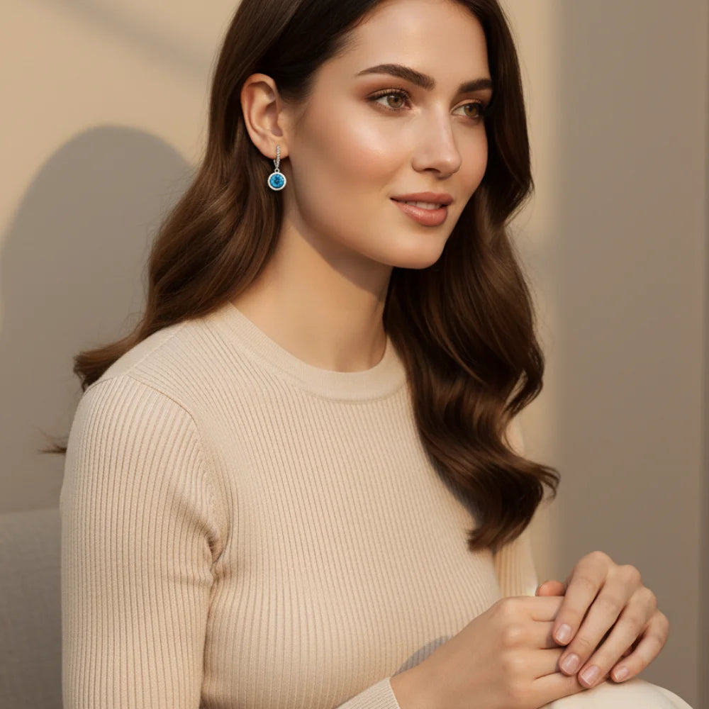 Kolczyki srebrne – pleciony uchwyt i niebieski kamień