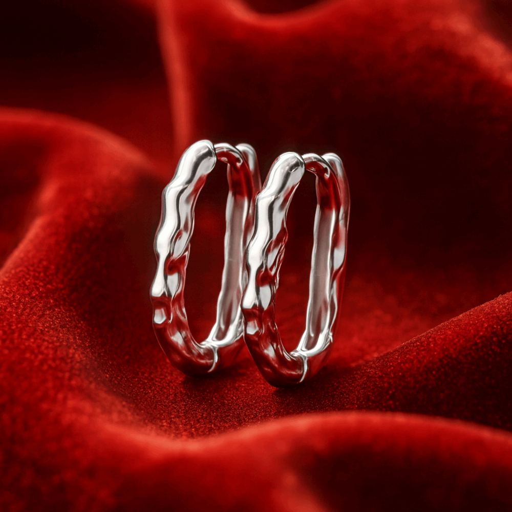 Kolczyki koła srebrne – nieregularne koła o fakturze bambusa