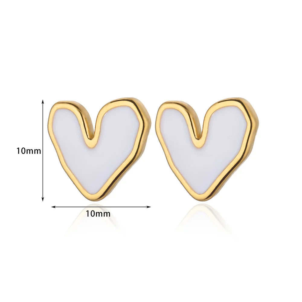Kolczyki sztyfty serca — asymetryczne, biało-złote