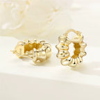 Kolczyki koła pozłacane – falowane rzeźbione koła