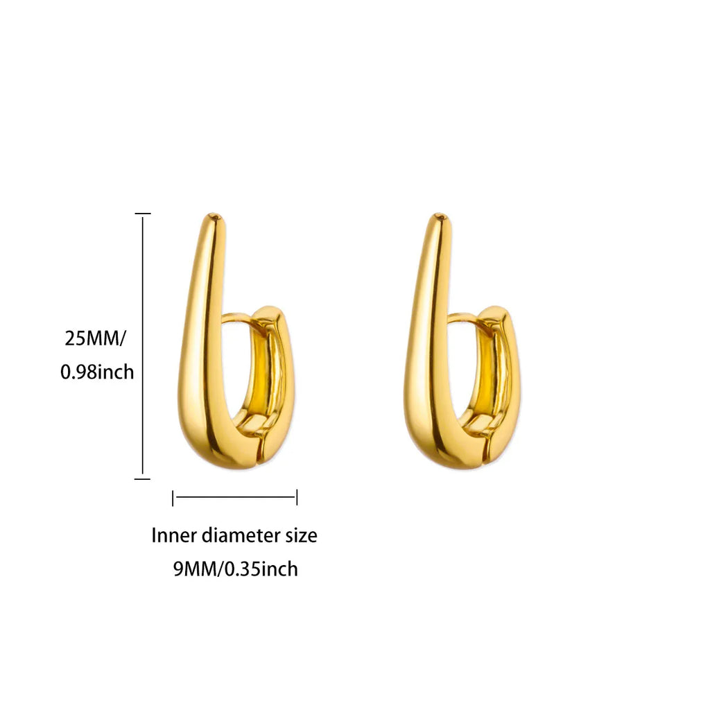Złote kolczyki hoop — geometryczne, smukłe i nowoczesne