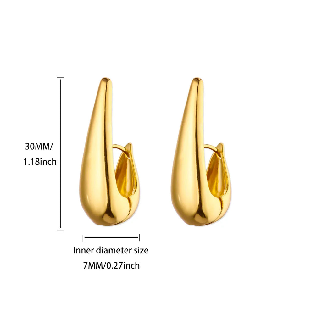 Złote kolczyki hoop — geometryczne, smukłe i elegancke