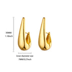 Złote kolczyki hoop — geometryczne, smukłe i elegancke