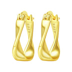 Kolczyki koła pozłacane – skręcone koła ze srebra 925 – złoty twist